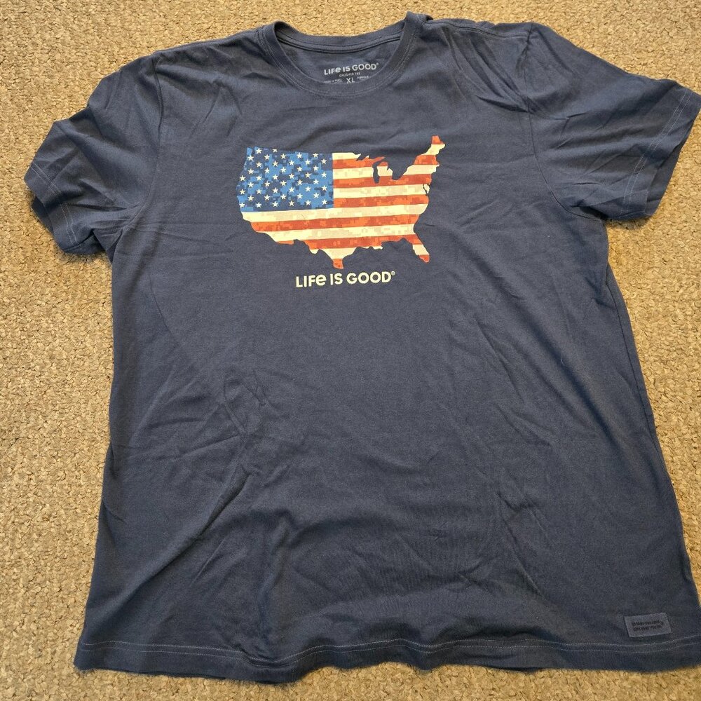 blue Life is Good t-shirt featuring a graphic of the USA map filled with an Amer